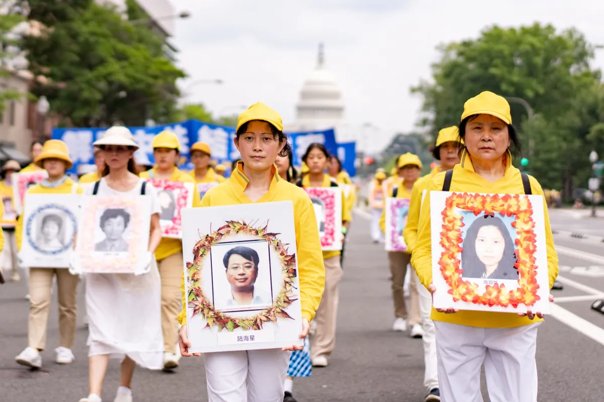 Falun Gong practitioners take part in a parade to mark the 24th anniversary of the persecution of the spiritual discipline in China by the Chinese Communist Party in Washington on July 20, 2023. (Samira Bouaou/The Epoch Times) 