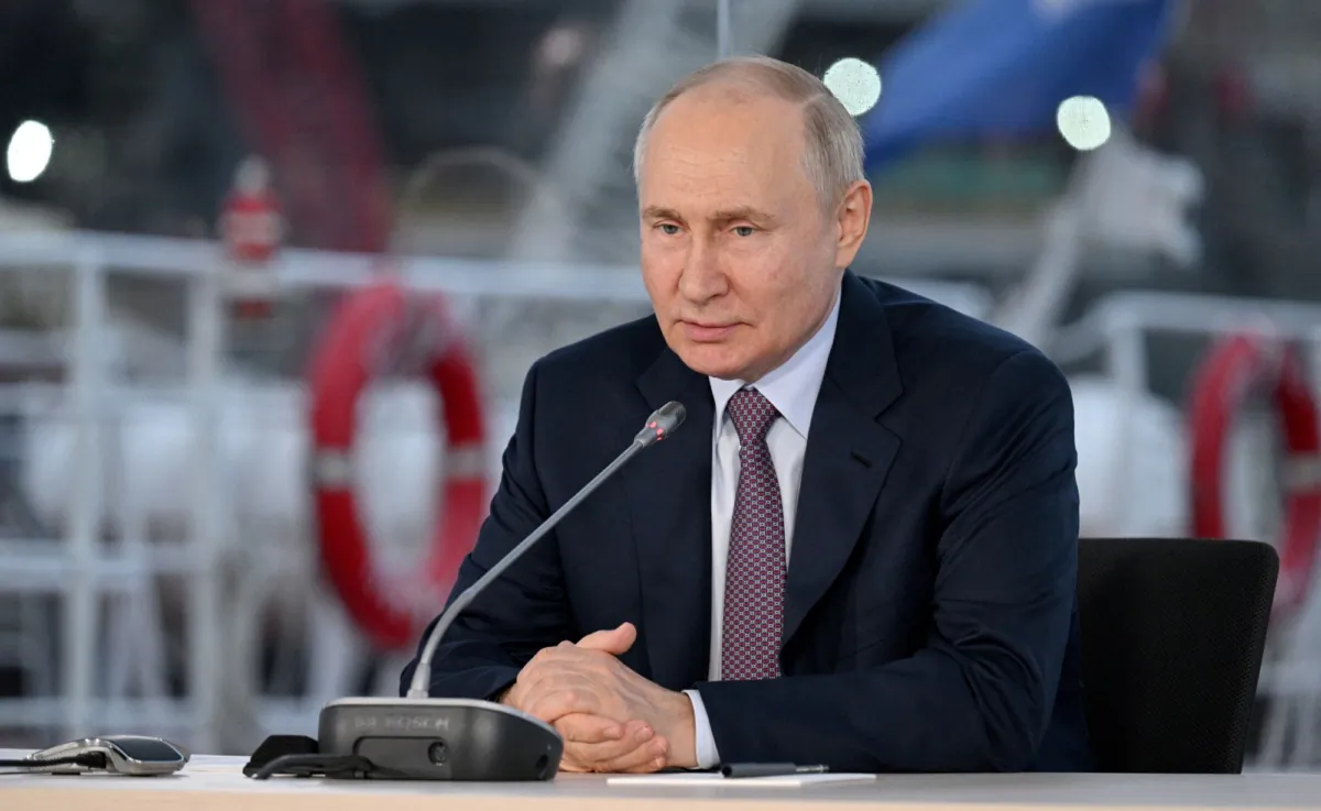 Russian President Vladimir Putin chairs a meeting at the Novatek-Murmansk's Offshore Superfacility Construction Center in the village of Belokamenka, Murmansk region, Russia, on July 20, 2023. (Sputnik/Ramil Sitdikov/Kremlin via Reuters)