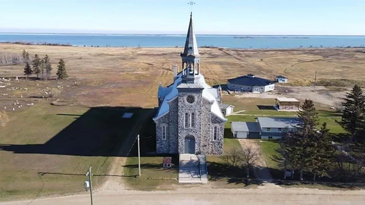 The community is set to begin excavating the area underneath the Our Lady of Seven Sorrows Catholic Church. (The Canadian Press/HO-Justin Richard)
