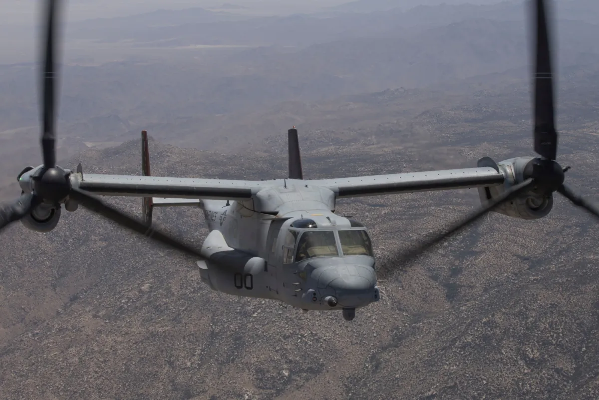 An MV-22B Osprey with Marine Operational Test and Evaluation Squadron (VMX) 1 transports ordnance during an Expeditionary Advanced Base Operation (EABO) exercise to Old Highway 101 near Marine Corps Base Camp Pendleton, Calif., on May 25, 2022. (U.S. Marine Corps via AP)