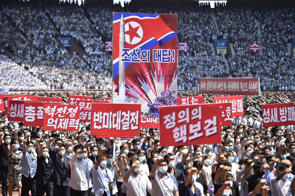 Residents of Pyongyang at a mass rally to mark the 73rd anniversary of the Korean War at the Mayday Stadium in Pyongyang, North   Korea, on June 25, 2023. (Kim Won Jin/AFP via Getty Images)