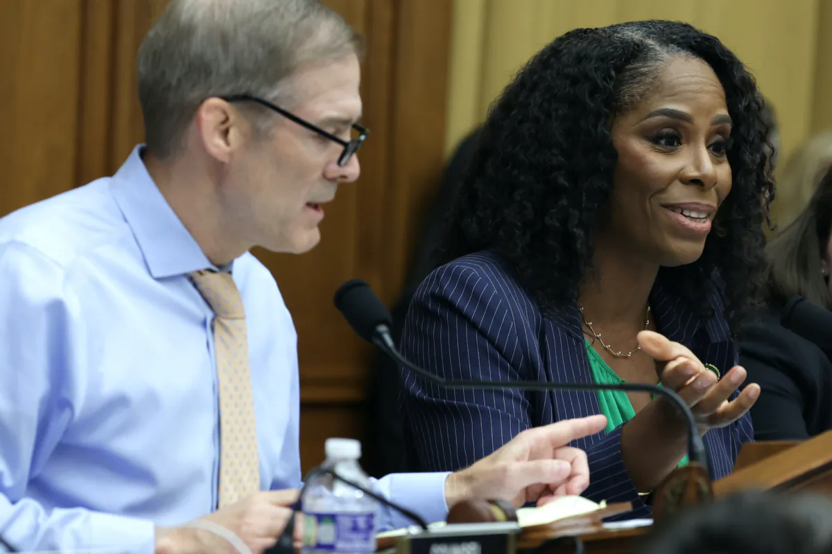 Ranking member Rep. Stacey Plaskett (D-VI), right, debates with Chairman Rep. Jim Jordan (R-Ohio), left, during a hearing before the Select Subcommittee on the Weaponization of the Federal Government of the House Judiciary Committee at Rayburn House Office Building, Capitol Hill in Washington on May 18, 2023. (Alex Wong/Getty Images)