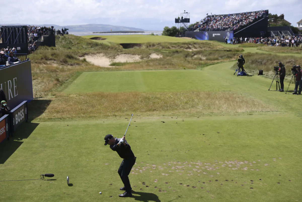 United States' Brian Harman plays his tee shot on the 17th hole during the second day of the British Open Golf Championships at the Royal Liverpool Golf Club in Hoylake, England on July 21, 2023. (Peter Morrison/AP Photo)