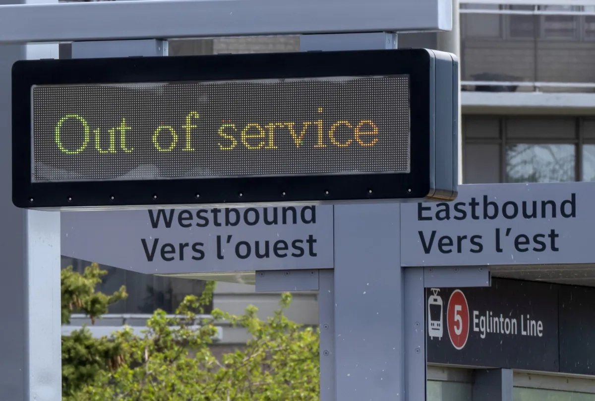 "Out of Service" signs are shown on the Eglinton Crosstown LRT, which has been under construction for 10 years, in Toronto on May 5, 2023. (The Canadian Press/Frank Gunn)