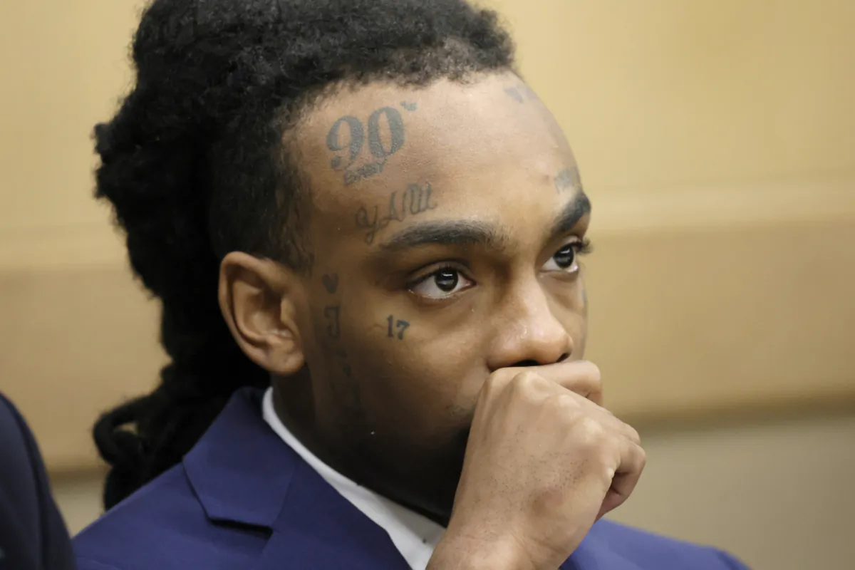 Jamell Demons, better known as rapper YNW Melly, at the defense table as a question from the jury is read by the judge in his trial at the Broward County Courthouse in Fort Lauderdale, Fla., on July 21, 2023. (Amy Beth Bennett/South Florida Sun-Sentinel via AP)