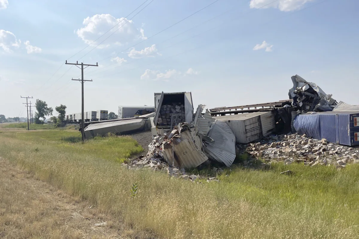 Freight cars from a BNSF Railway train are derailed east of Havre, Mont., on July 21, 2023. (Amanda Frickel/Hill County Disaster and Emergency Services via AP)