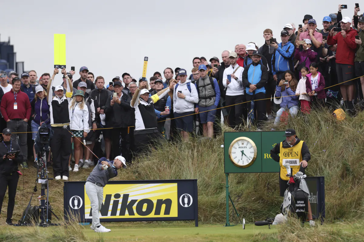 United States' Brian Harman plays his tee shot on the 14th hole during the third day of the British Open Golf Championships at the Royal Liverpool Golf Club in Hoylake, England on July 22, 2023. (Peter Morrison/AP Photo)