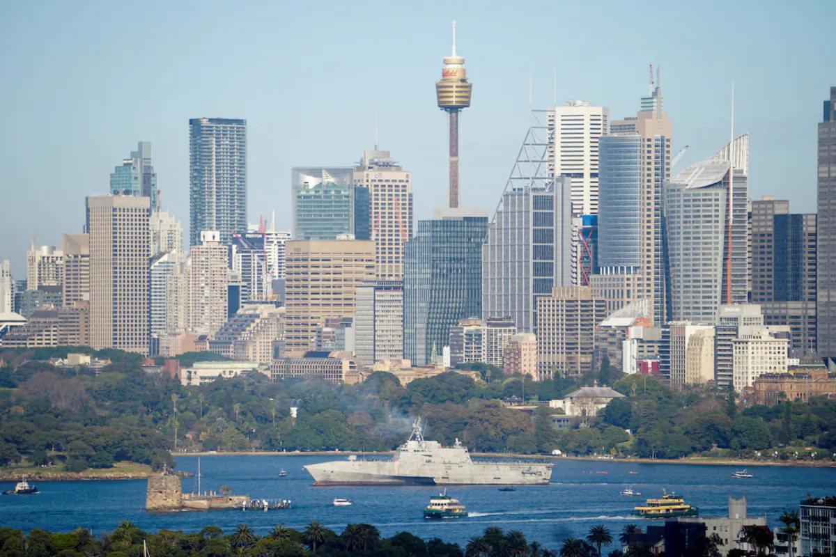 Independence-variant littoral combat ship USS Canberra (LCS 30) arrives in Sydney, ahead of its commissioning ceremony on July 22, in Sydney, Australia, on July 18, 2023. (Stephen Coates/Reuters)