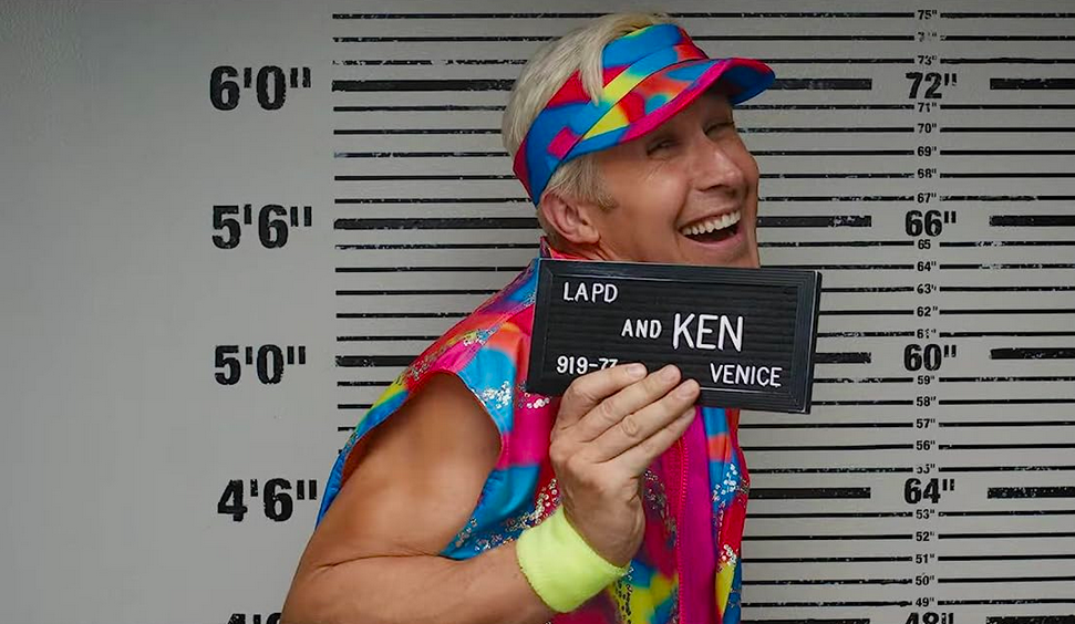 man getting a mugshot in BARBIE