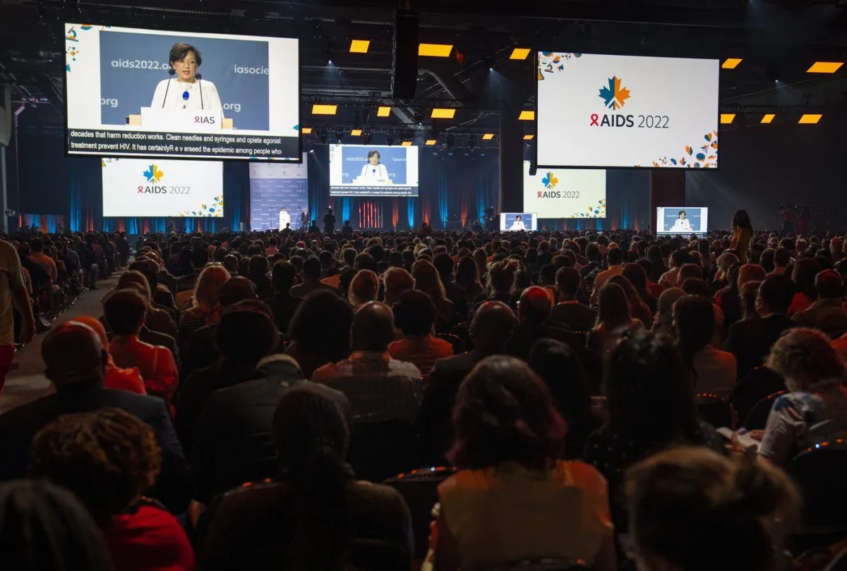 Adeeba Kamarulzaman, president of the International Aids Society addresses the opening ceremony of the AIDS 2022 conference in Montreal on July 29, 2022. (The Canadian Press/Paul Chiasson)