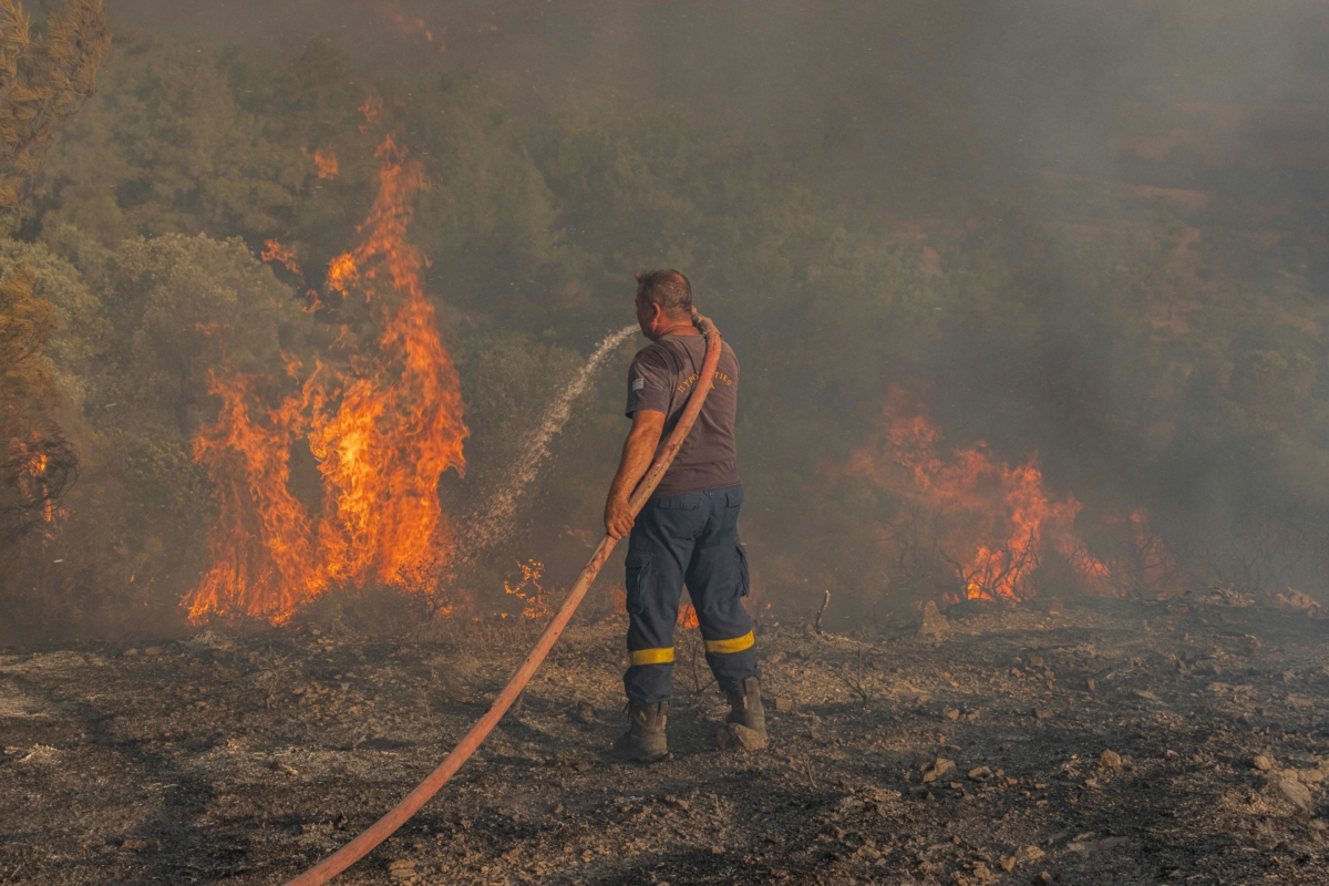 NextImg:British Tourists Evacuated From Wildfire-Hit Greek Island on Repatriation Flights