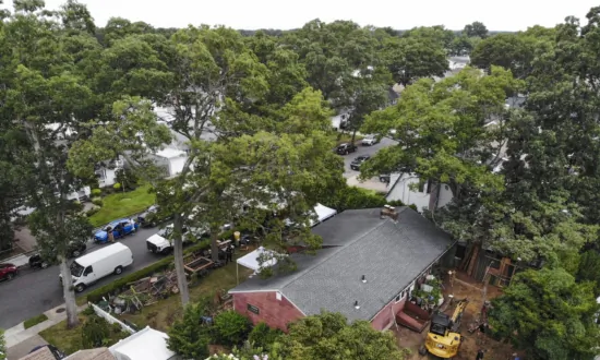 Excavator Seen Digging in Backyard of Man Charged in Gilgo Beach Killings