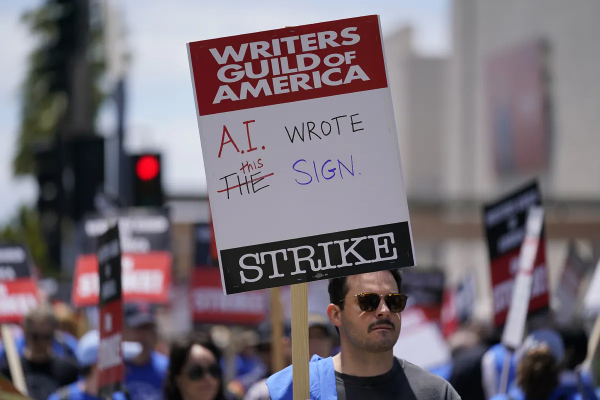 Members of The Writers Guild of America picket outside Fox Studios in Los Angeles, Calif., on May 2, 2023. (Ashley Landis/AP Photo)