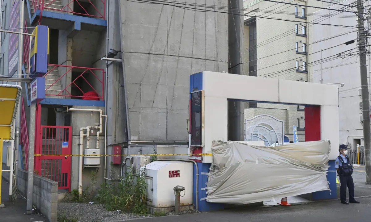 A hotel where the headless body of a man was found in Sapporo, northern Japan, on July 8, 2023. (Kyodo News via AP)