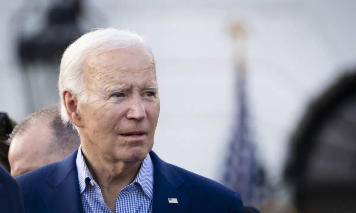 President Joe Biden greets lawmakers and their families during a Congressional picnic at the South Lawn of the White House in Washington on July 19, 2023. (Madalina Vasiliu/The Epoch Times)
