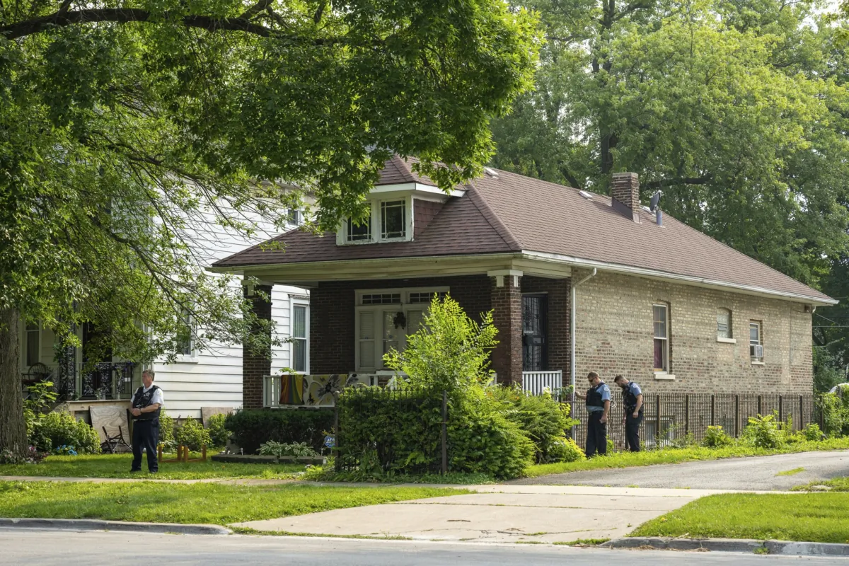 Chicago police work the scene of a stand off between Chicago Police's SWAT and a armed 10-year-old boy in Chicago on July 24, 2023. (Tyler Pasciak LaRiviere/Chicago Sun-Times via AP)