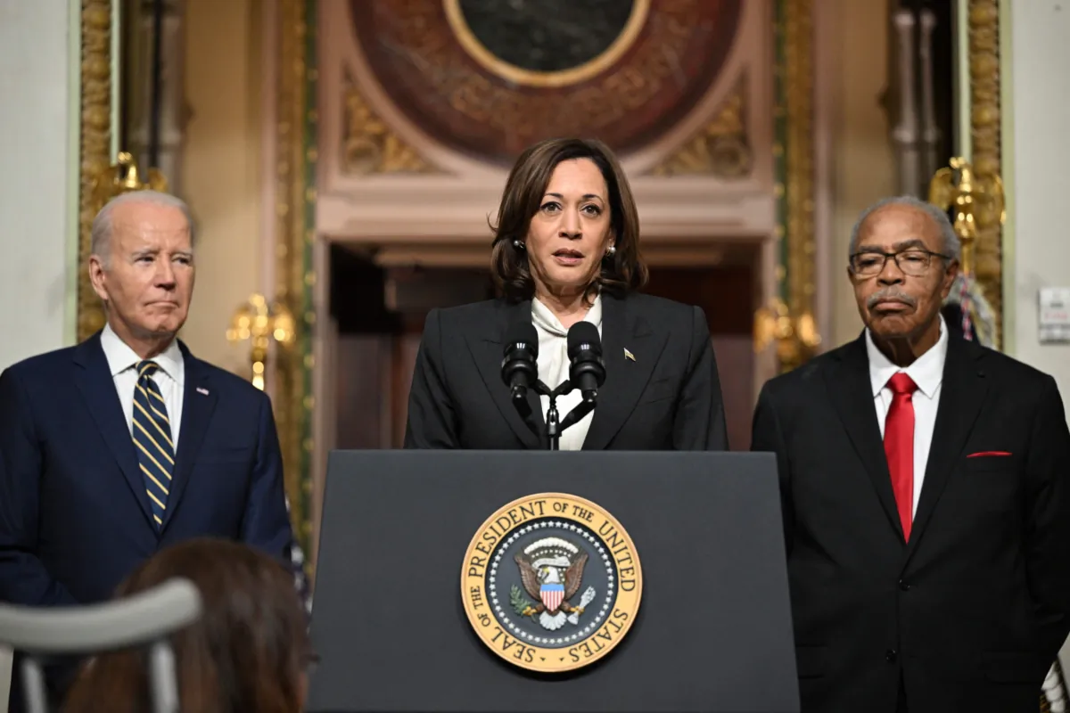 Vice President Kamala Harris (C), with President Joe Biden (L), speaks at a signing ceremony in the Indian Treaty Room of the Eisenhower Executive Office Building next to the White House on July 25, 2023. (Mandel Ngan/AFP via Getty Images)
