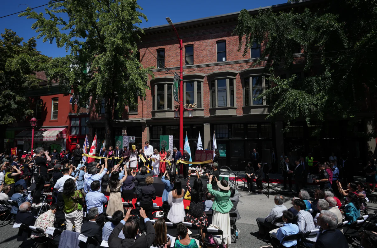 Dignitaries including B.C. Premier David Eby, Vancouver Mayor Ken Sim, and Federal Minister of International Trade, Export Promotion, Small Business and Economic Development Mary Ng cut a ribbon during the grand opening ceremony for the Chinese Canadian Museum in Vancouver on June 30, 2023. The new museum is located in the historic Wing Sang Building, Vancouver Chinatown's oldest building, and opens to the public on July 1, 2023. (The Canadian Press/Darryl Dyck)