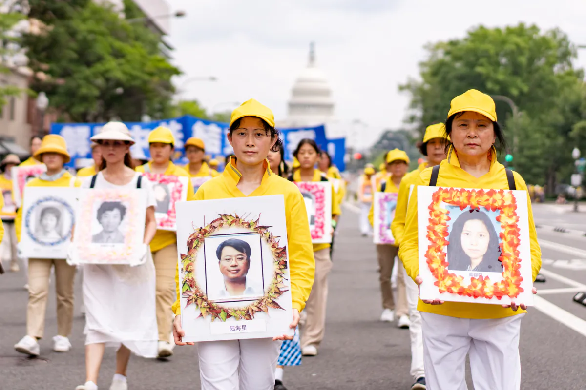 Falun Gong adherents participate in a rally to mark the 24th anniversary of the Chinese regime’s persecution of the spiritual discipline in Washington on July 20, 2023. (Samira Bouaou/The Epoch Times)