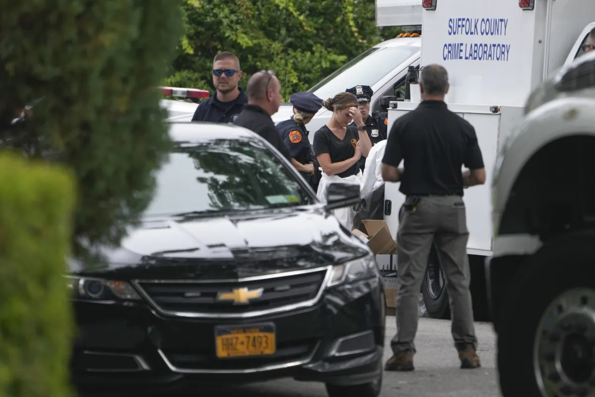 Authorities continue to work at the home of suspect Rex Heuermann in Massapequa Park, N.Y., on July 24, 2023. (Seth Wenig/AP Photo)