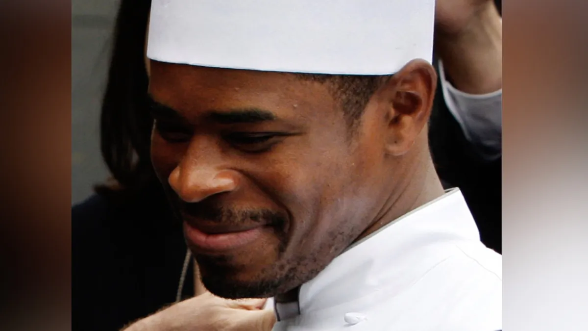 White House chef Tafari Campbell smiles on the South Lawn of the White House in Washington on Nov. 6, 2008. (Ron Edmonds/AP Photo)