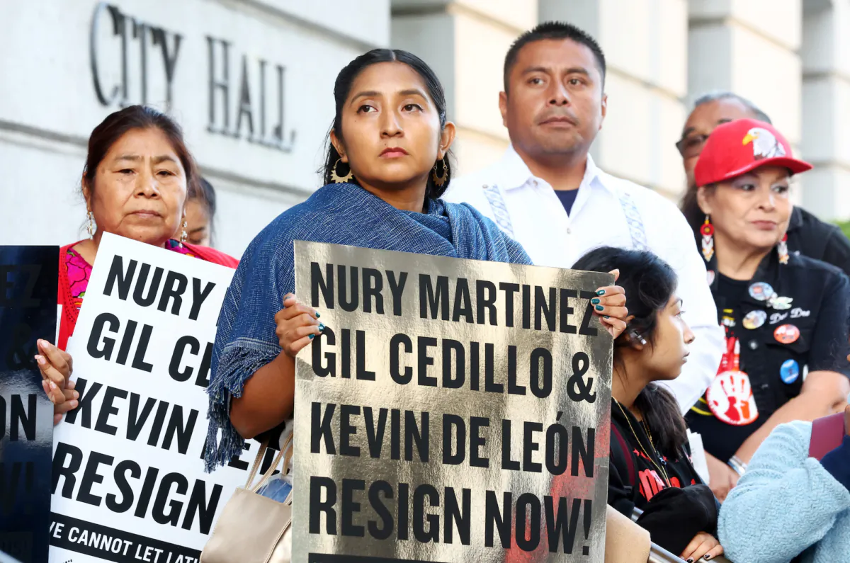 Protestors demonstrate outside City Hall calling for the resignations of L.A. City Council members Nury Martinez, Kevin de Leon, and Gil Cedillo in the wake of a leaked audio recording in Los Angeles, Calif., on Oct. 12, 2022. (Photo by Mario Tama/Getty Images)