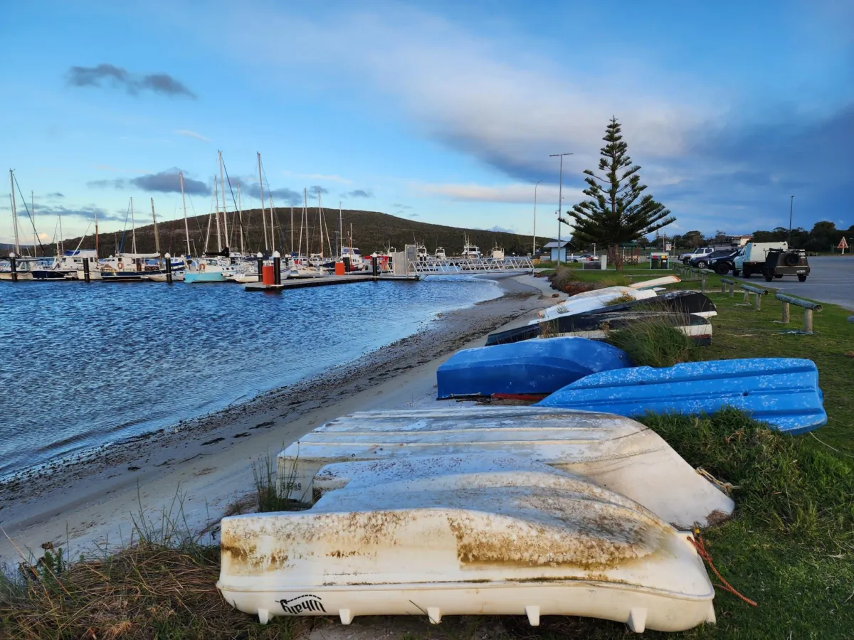 Fishing boats can be seen behind a row of dinghies at Emu Point in Albany, Western Australia, on July 26, 2023. (Susan Mortimer/The Epoch Times)