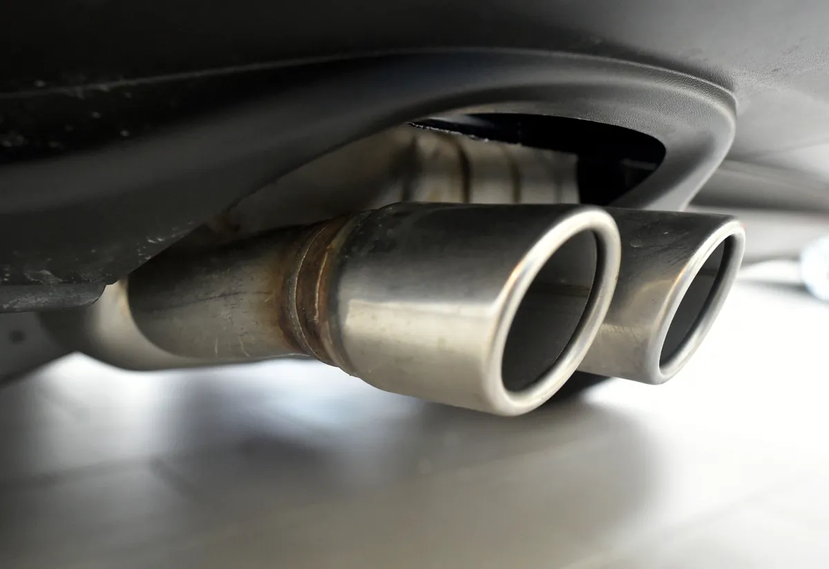 Exhaust pipes are seen on a Volkswagen vehicle at an auto dealership in San Francisco on March 24, 2016. (Josh Edelson/AFP via Getty Images)