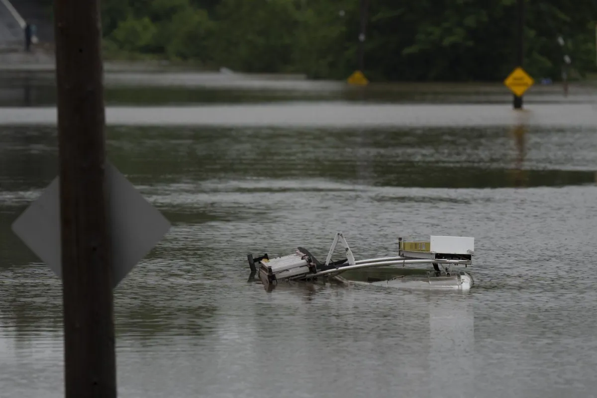The top of a service truck is seen abandoned in floodwater following a major rain event in Halifax on July 22, 2023. (The Canadian Press/Darren Calabrese)