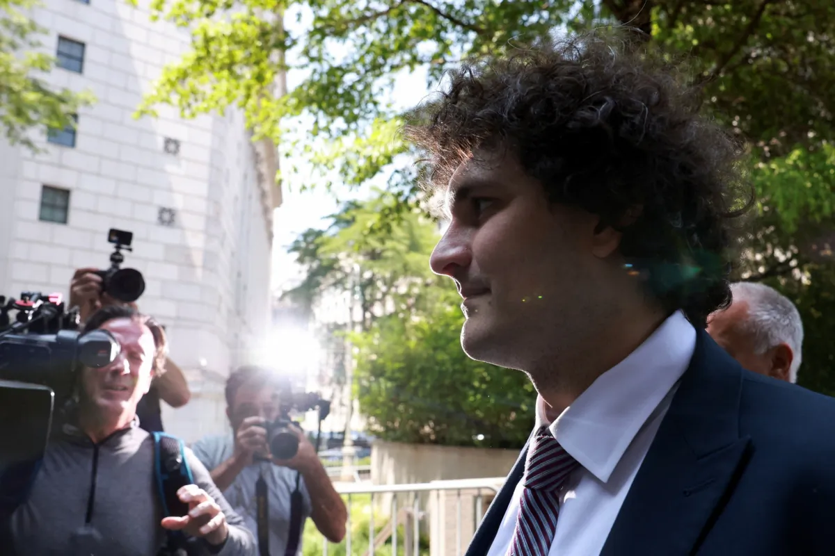 Indicted FTX founder Sam Bankman-Fried walks outside at the United States Courthouse in New York on July 26, 2023. (Amr Alfiky/Reuters)