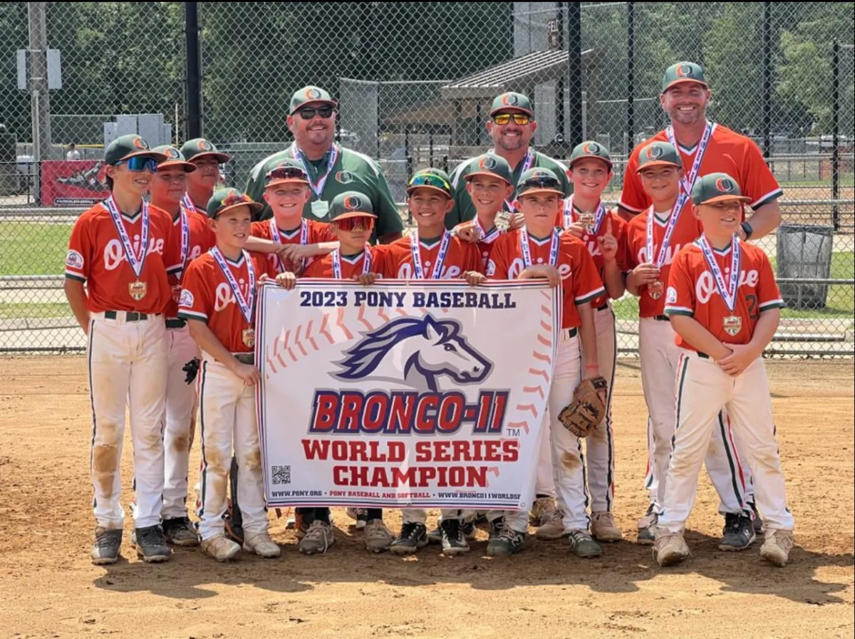The Olive Pony Baseball’s 11-and-under team pose for a photo after they won the World Series championship in Chesterfield, Va., on July 24, 2023. (Courtesy of Greg Cicero)