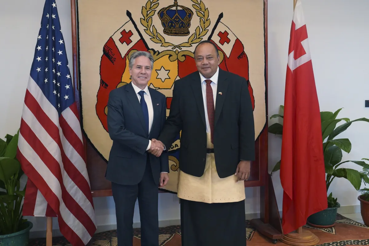 Secretary of State Antony Blinken, left, shakes hands with Tonga's Prime Minister Siaosi Sovaleni in Nuku'alofa, Tonga on July 26, 2023. (Tupou Vaipulu/Pool Photo via AP)