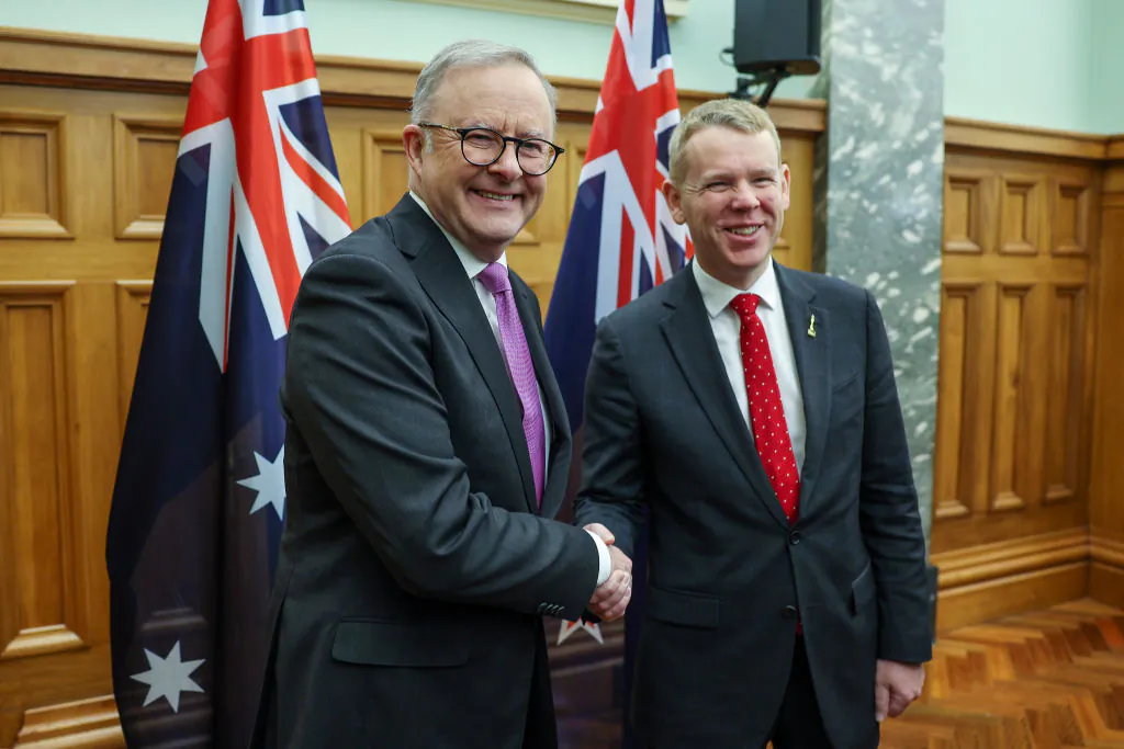 New Zealand Prime Minister Chris Hipkins (R) shakes hands with Australian Prime Minister Anthony Albanese during a Ceremony of Welcome at Parliament in Wellington, New Zealand, on July 26, 2023. (Hagen Hopkins/Getty Images)