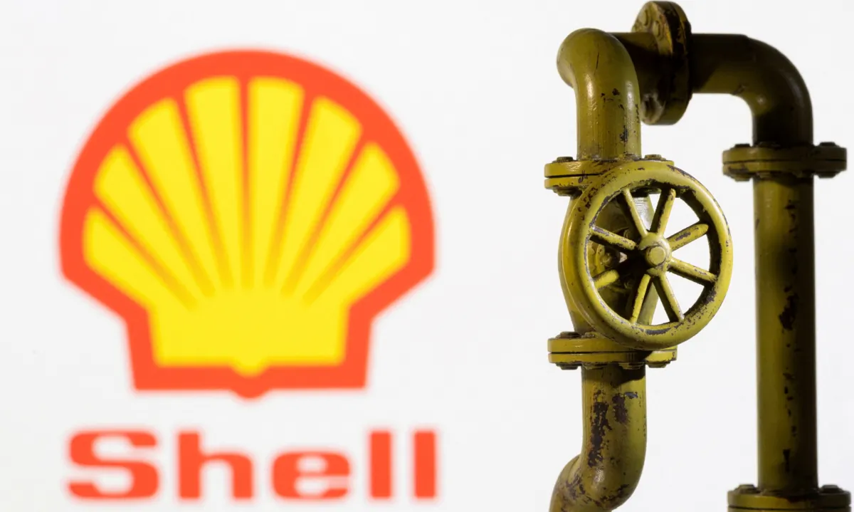 A 3D printed natural gas pipeline is placed in front of displayed Shell logo on Feb. 8, 2022. (Dado Ruvic/Illustration/Reuters)
