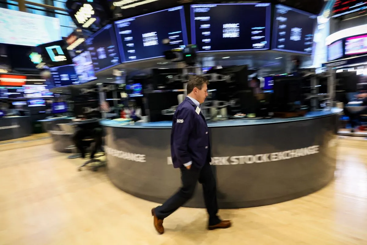 A trader works on the floor of the New York Stock Exchange (NYSE) in New York City on July 26, 2023. (Brendan McDermid/Reuters)