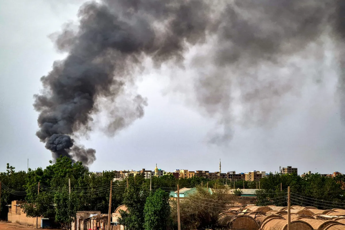 Smoke billows from a fire at a lumber warehouse in southern Khartoum amid ongoing fighting in Sudan on June 7, 2023. (AFP via Getty Images)