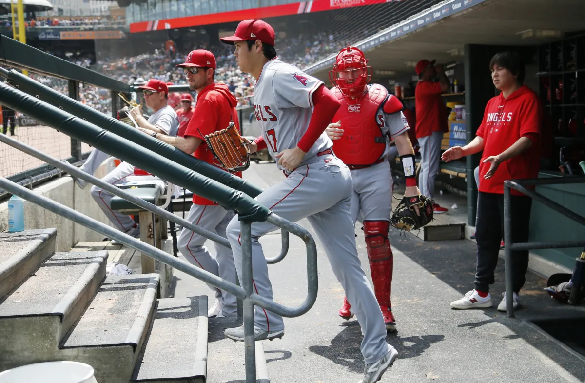 Shohei Ohtani (17) of the Los Angeles Angels heads back to the field for the sixth inning of game one of a doubleheader against the Detroit Tigers at Comerica Park in Detroit on July 27, 2023. (Duane Burleson/Getty Images)