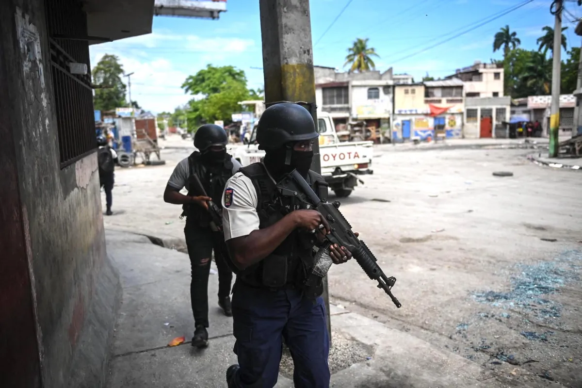 Police officers patrol a neighborhood amid gang-related violence in downtown Port-au-Prince, Haiti
on April 25, 2023. (Richard Pierrin/AFP via Getty Images)
