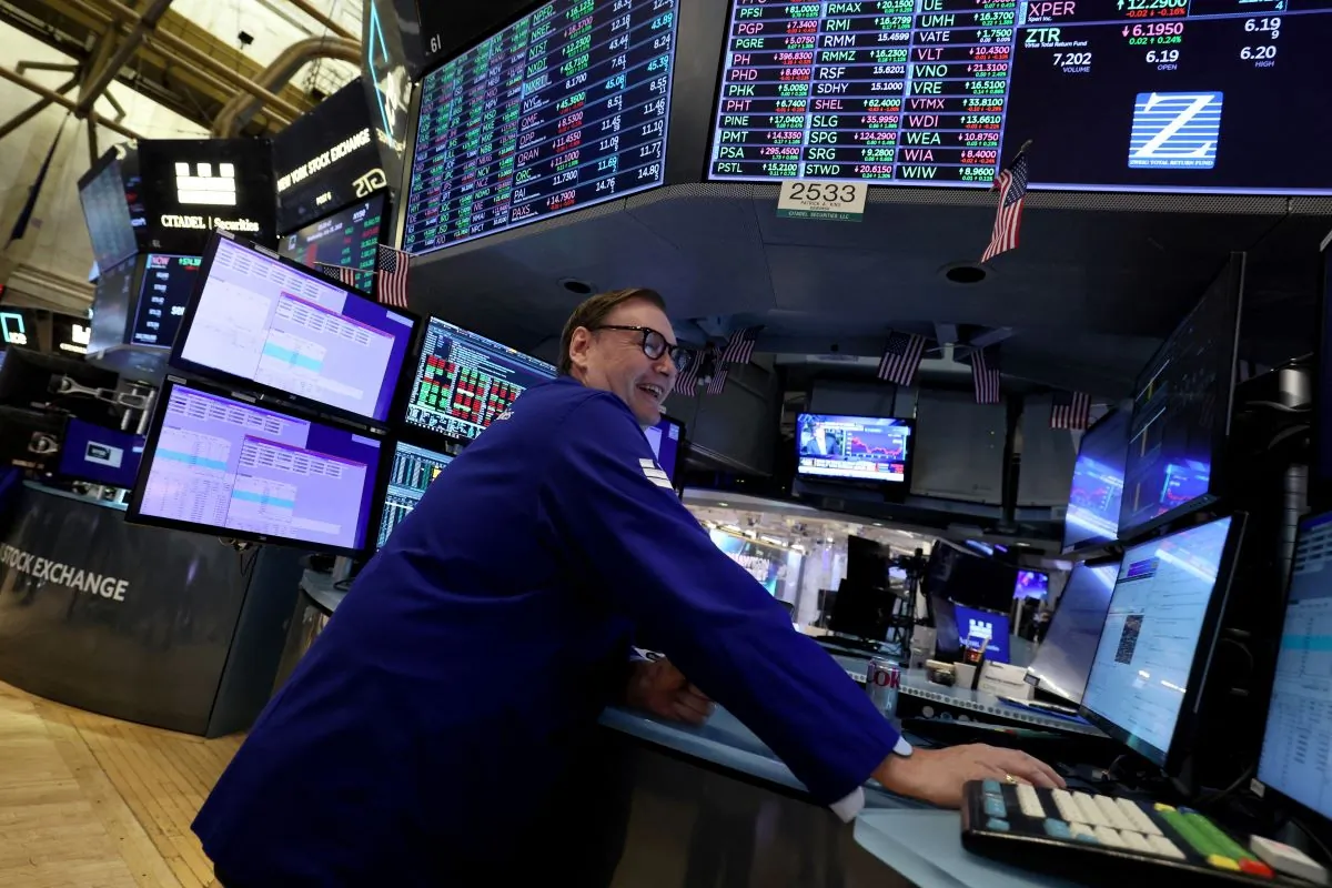 A trader works on the floor of the New York Stock Exchange (NYSE) in New York City on July 26, 2023. (Brendan McDermid/Reuters)
