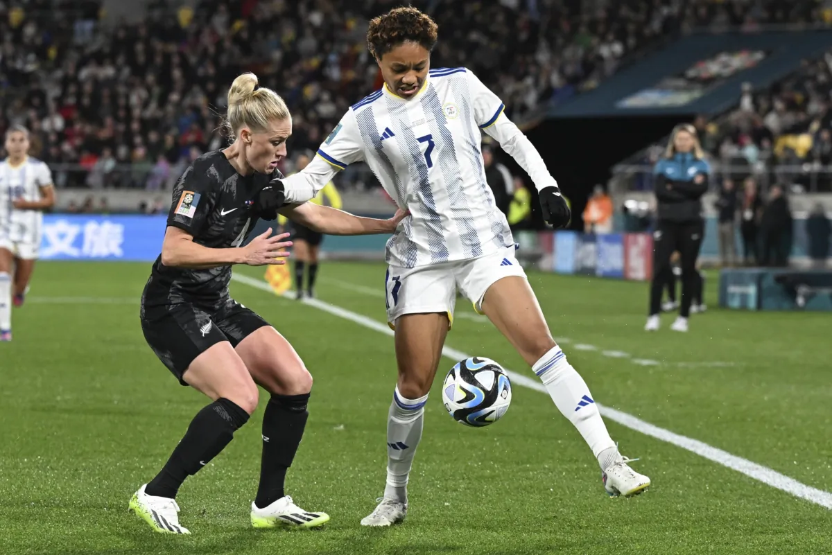 Philippines' Sarina Bolden (R) competes for the ball with New Zealand's C.J. Bott during the Women's World Cup Group A soccer match between New Zealand and the Philippines in Wellington, New Zealand, on July 25, 2023. (Andrew Cornaga/AP Photo)