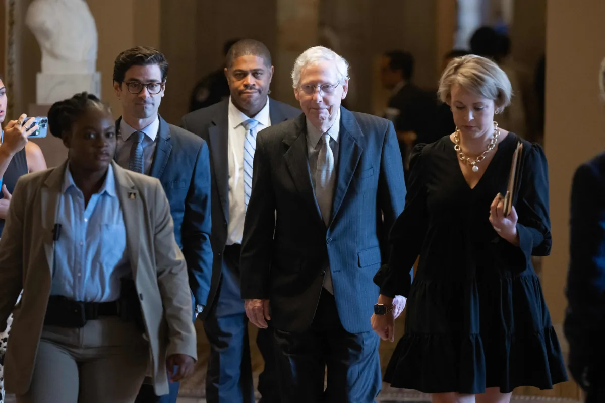 Senate Minority Leader Mitch McConnell (R-Ky.) walks one day after freezing during a press conference, on Capitol Hill in Washington on July 27, 2023. (Saul Loeb/Getty Images)