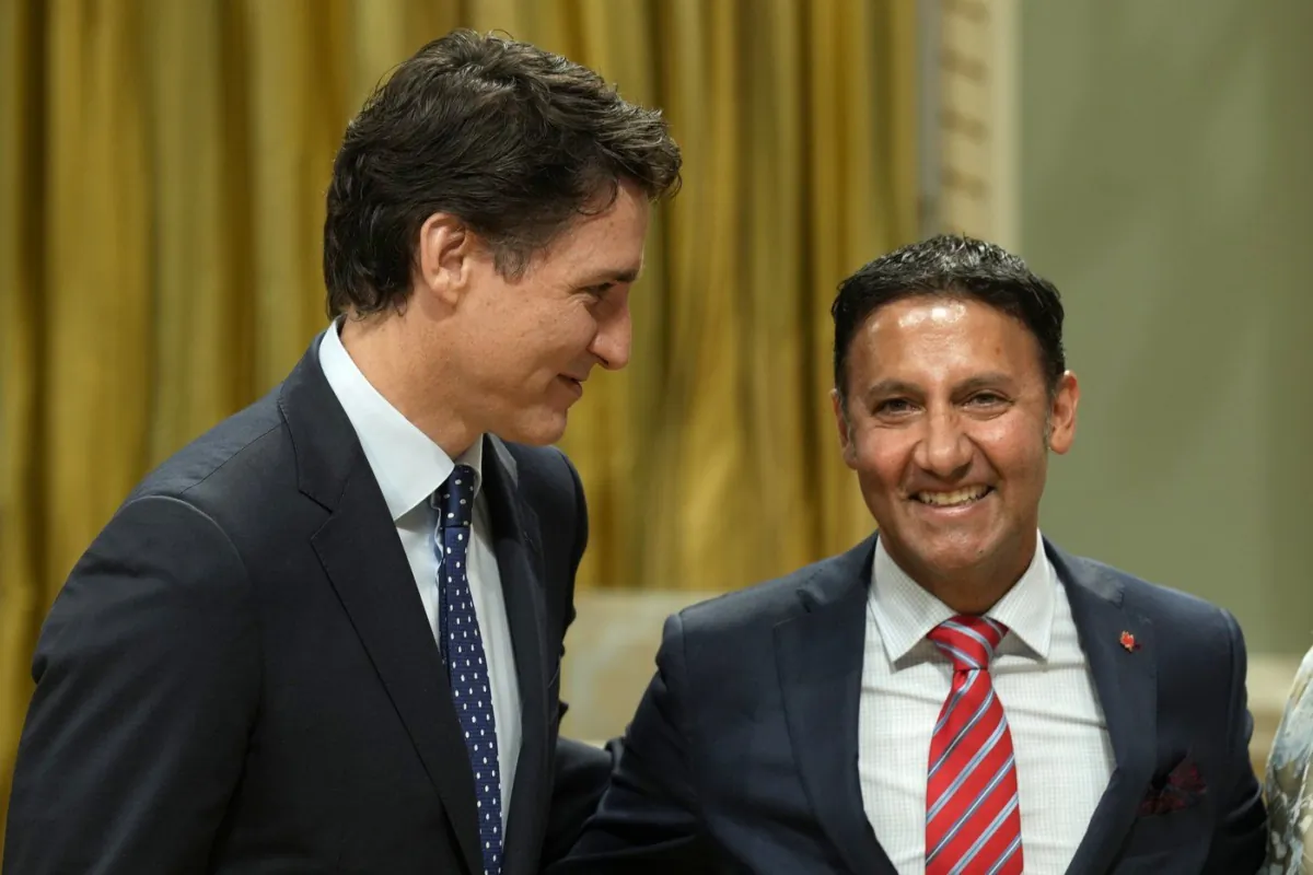 Minister of Justice and Attorney General of Canada Arif Virani poses for a photo with Prime Minister Justin Trudeau during a cabinet swearing-in ceremony at Rideau Hall in Ottawa, July 26, 2023. (The Canadian Press/Adrian Wyld)