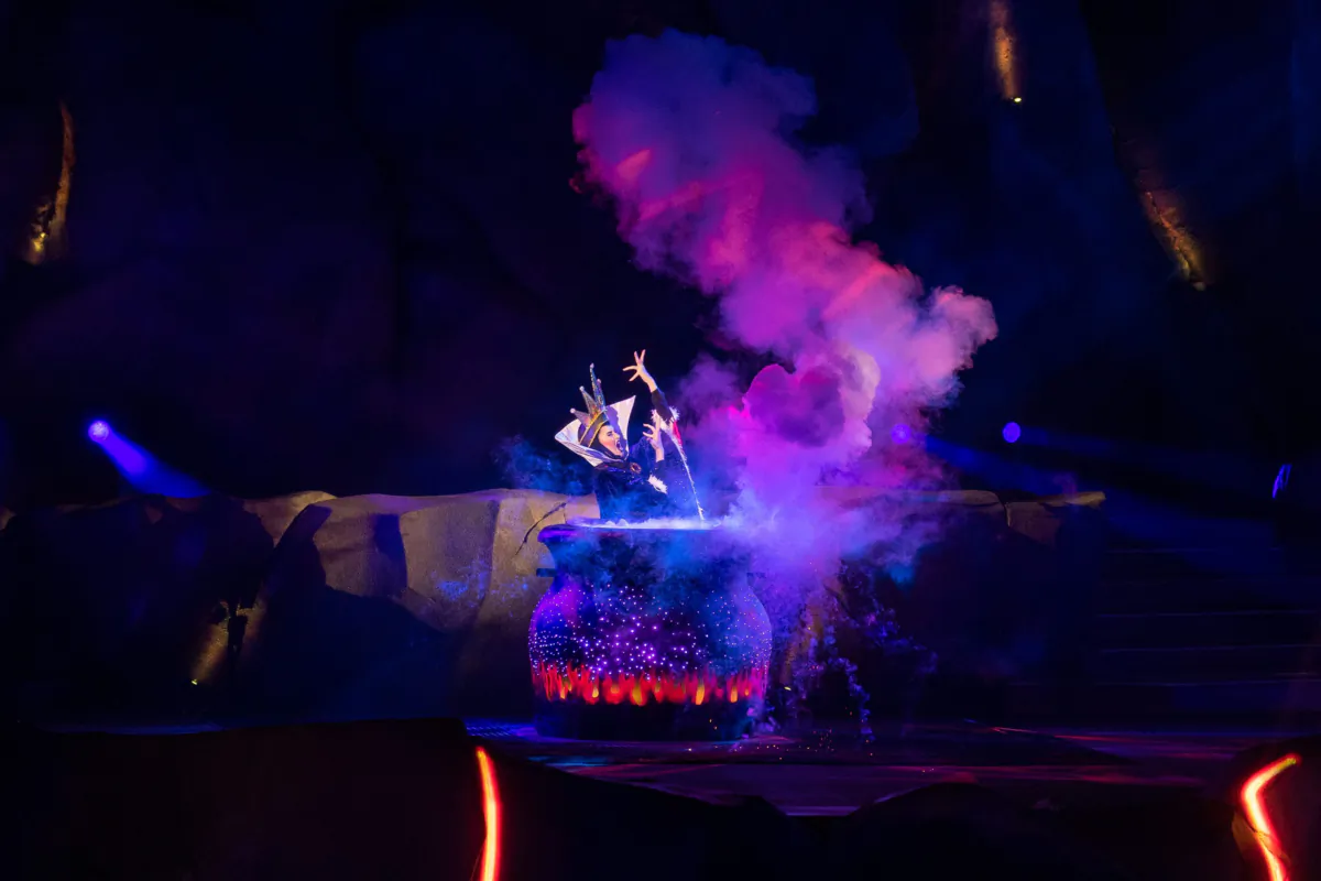 The Evil Queen from “Snow White and the Seven Dwarfs” calls upon other villains to intrude on Mickey’s fantasy and turn his dream into a nightmare as Fantasmic! The show closed in Disneyland after a fiery mishap in April 2023. (Matt Stroshane/Walt Disney/TNS)