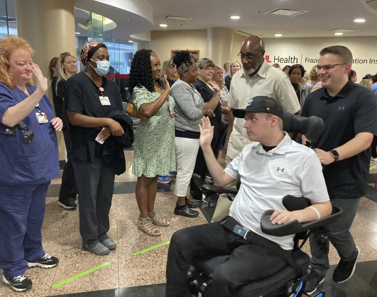 Louisville police officer Nickolas Wilt leaves a medical rehabilitation center in Louisville, Ky., on July 28, 2023. (Bruce Schreiner/AP Photo)