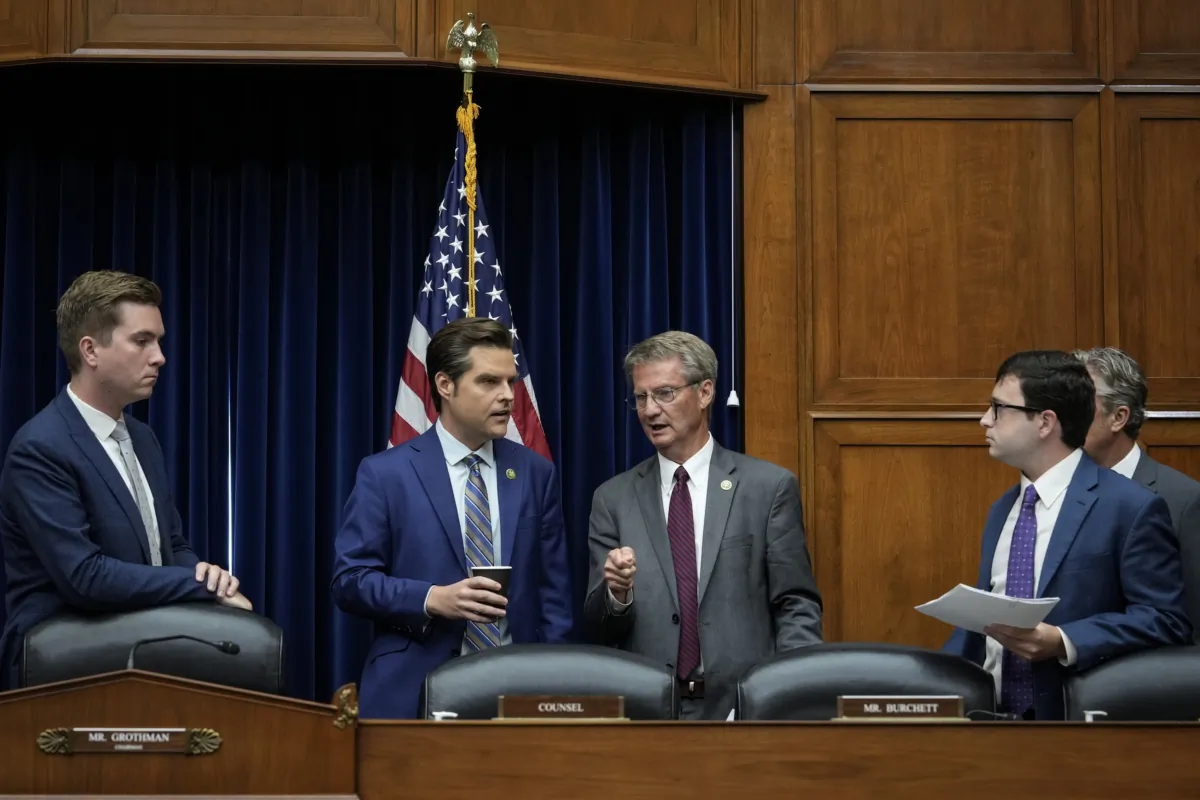 (L-R) Rep. Matt Gaetz (R-Fla.) talks with Rep. Tim Burchett (R-Tenn.) during a House Oversight Committee hearing titled "Unidentified Anomalous Phenomena: Implications on National Security, Public Safety, and Government Transparency" on Capitol Hill in Washington on July 26, 2023. (Drew Angerer/Getty Images)