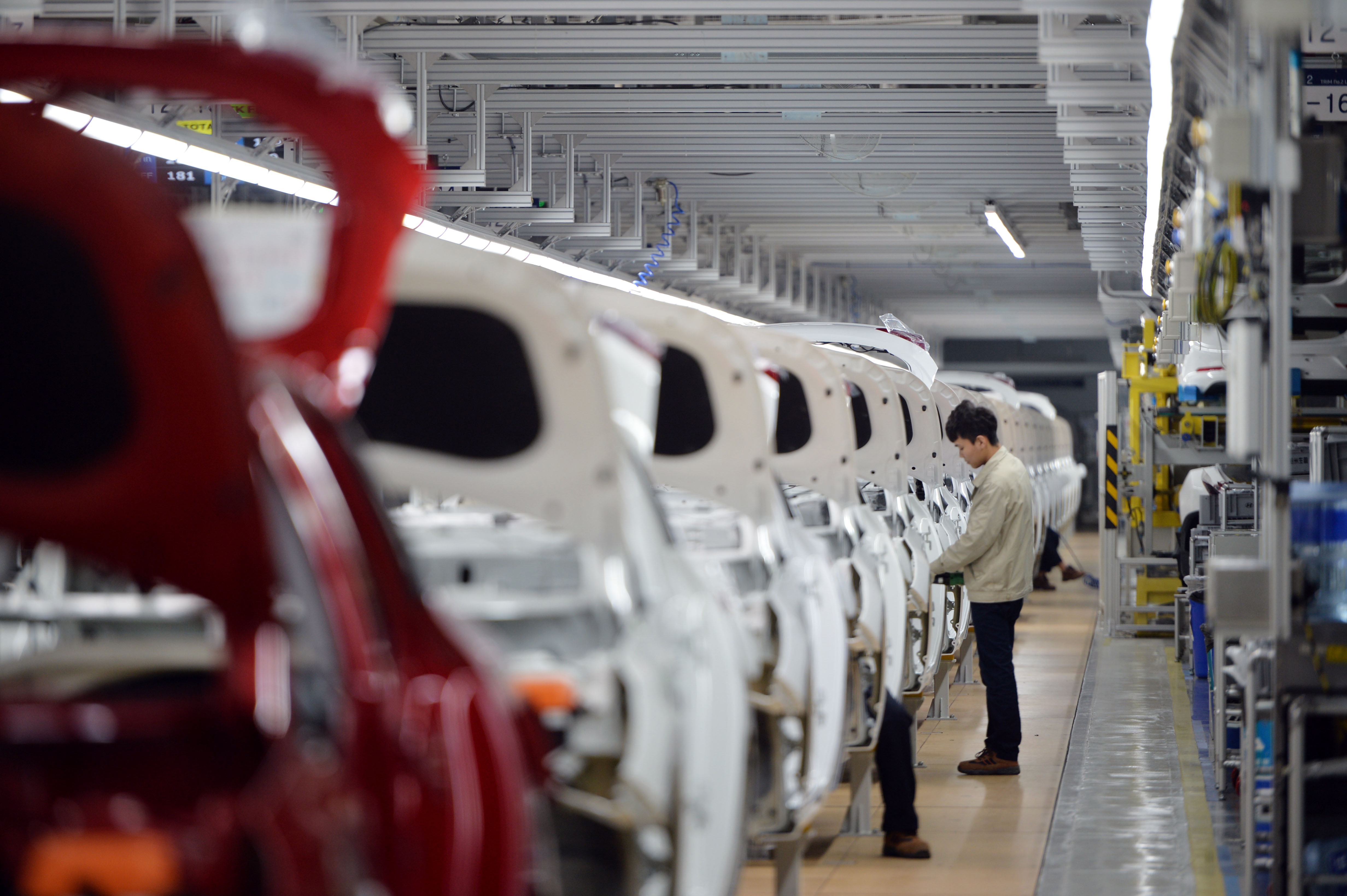 A worker in a Hyundai factory in Cangzhou, in China's northern Hebei Province, on Feb. 21, 2017. (STR/AFP via Getty Images)