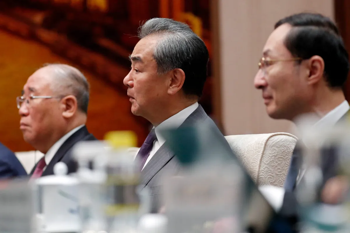 Chinese Foreign Minister Wang Yi (C) attends a meeting with U.S. Climate Envoy John Kerry at the Great Hall of the People in Beijing on July 18, 2023. (Florence Lo/Pool/AFP via Getty Images)