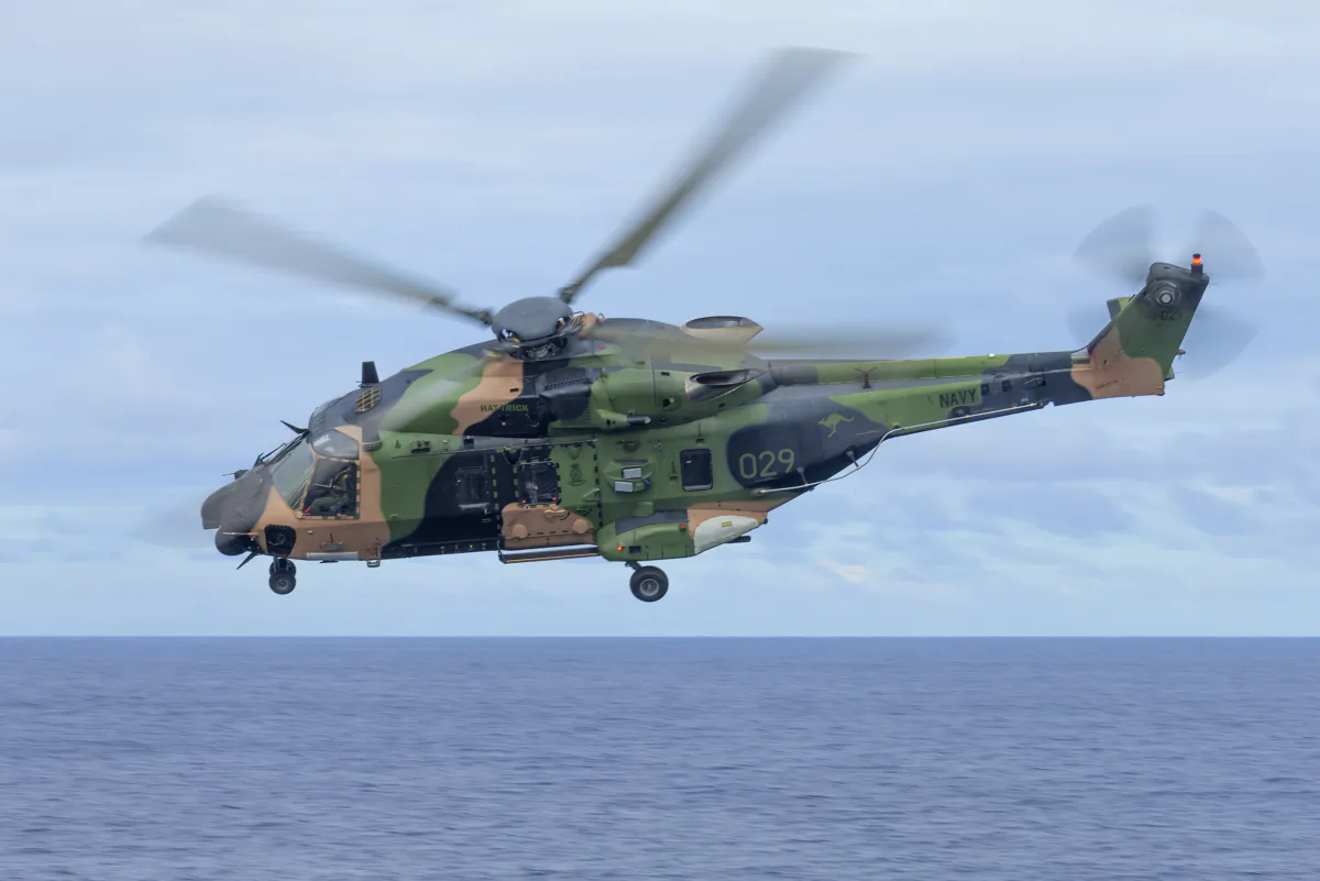 A supplied image obtained on July 29, 2023, of an Australian Army MRH-90 Taipan helicopter conducting flying serials during the ship’s transit to Vanuatu, July 23, 2020.  (AAP Image/Supplied by The Australian Defence Force)