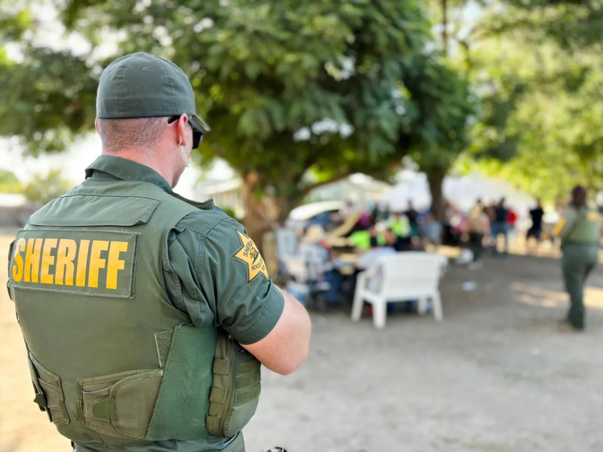 A Merced County Sheriff’s Department officer at an illegal marijuana grow operation in Merced, Calif., on July 26, 2023. (Courtesy of Merced County Sheriff’s Department)