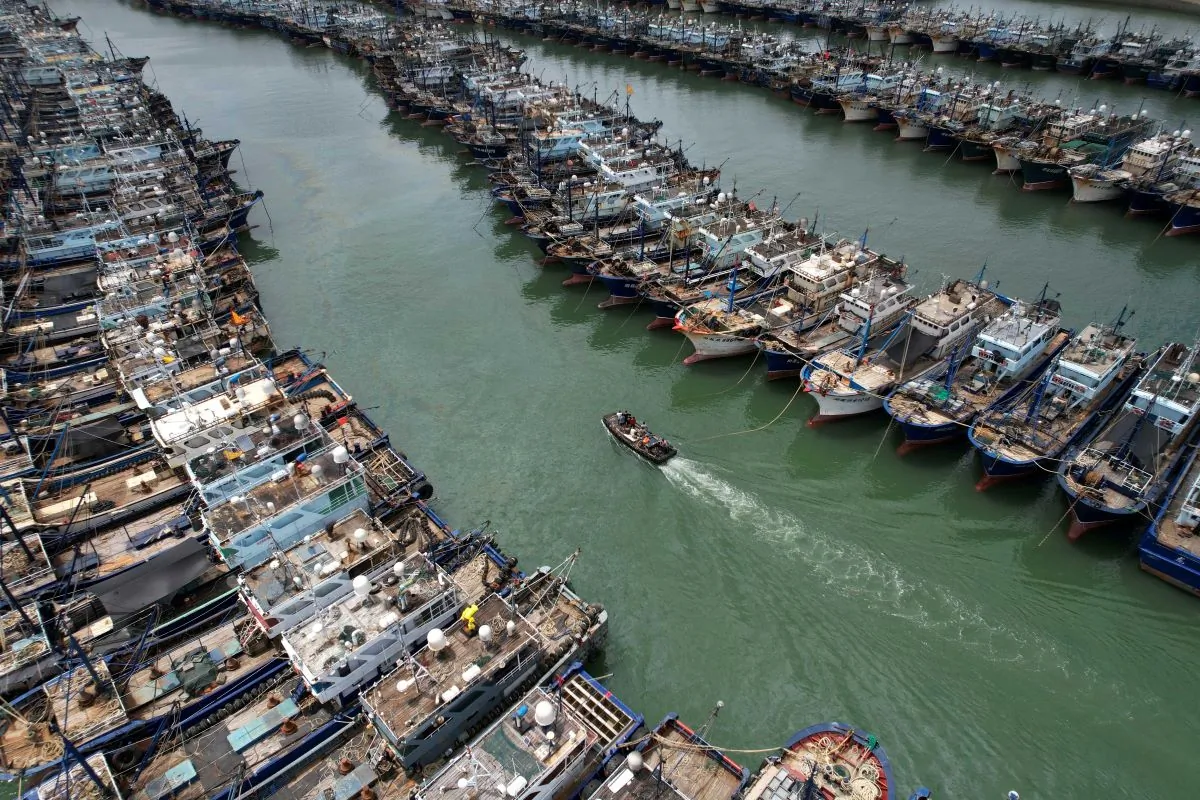 Fishing boats are moored at Gaoqi fishing port as typhoon Doksuri approaches, in Xiamen, Fujian Province, China, on July 26, 2023. (cnsphoto via Reuters)